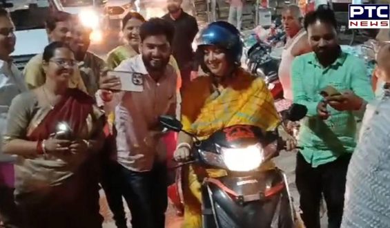 Minister Smriti Irani takes a scooter ride through Amethi