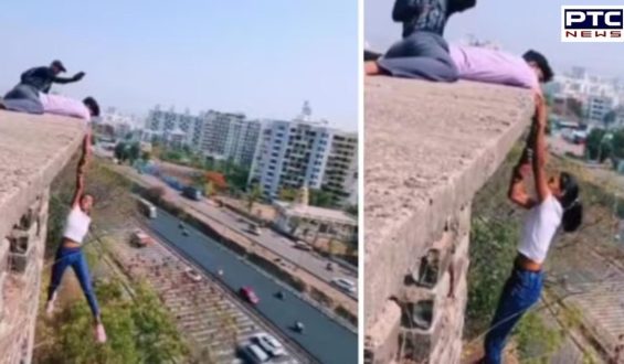 Viral video of Pune girl: Girl hangs from the top of a building stunt sparks outrage