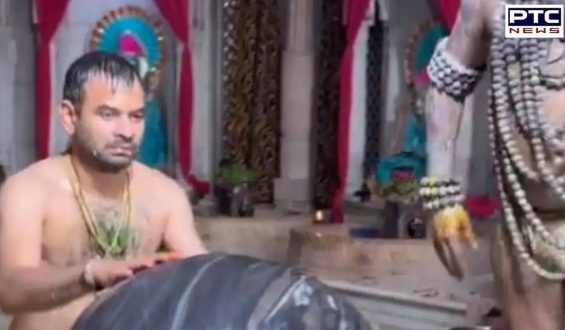 Tej Pratap Yadav embraces shivling during milk abhishekam ritual | Watch